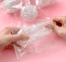 Load image into Gallery viewer, SNOW SQUISH – Clear Jelly Bead Stress Ball