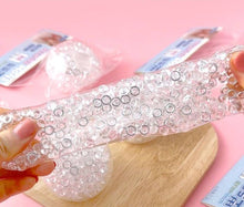 Load image into Gallery viewer, SNOW SQUISH – Clear Jelly Bead Stress Ball
